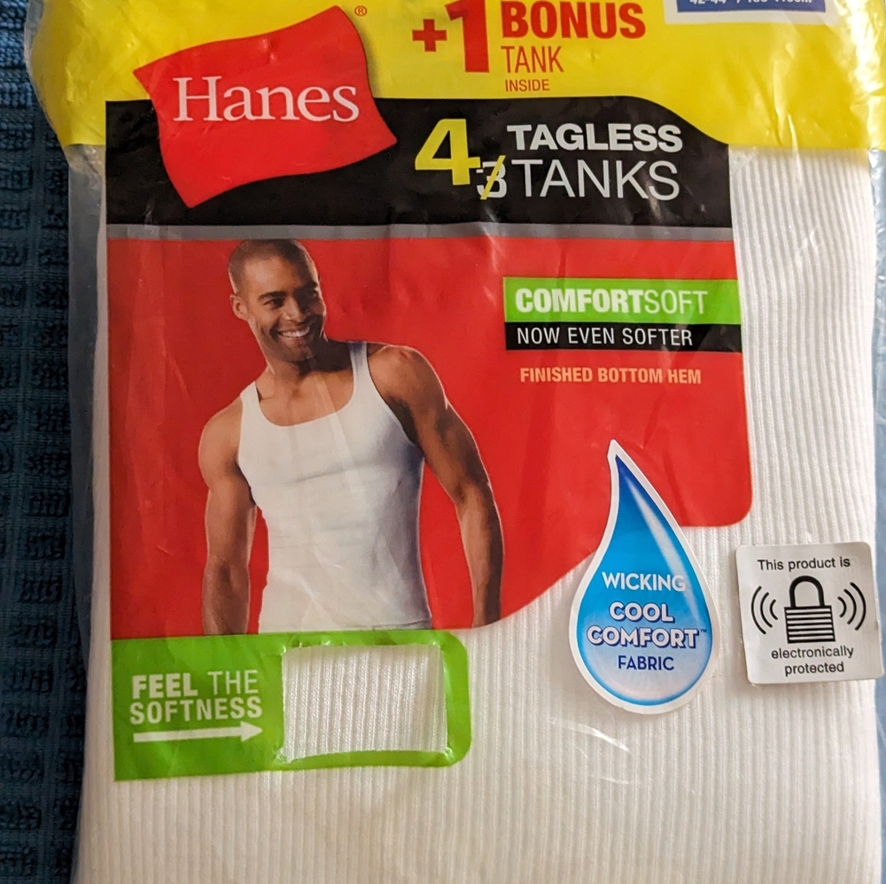 Brand New, Still In Bag Men's Hanes pack of 4 Tagless Tank Shirts.